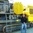 Latest News By : Farid Mohammadi<br />(by Jon M. Casey)<br />Source : www.atlascopco.us<br />Equipment dealer adds Atlas Copco PC2 to rental fleet ,<br />For the staff at Pine Bush Equipment (PBE), the choice for the addition of a Tier IV compliant, tracked portable jaw crusher became clear, the addition of an Atlas Copco PC2 crusher, outfitted with the HS1 Screen box was a clear choice. Since they had been representing the Atlas Copco line for some time, and offered a rental fleet that includes crushing and screening equipment from other manufacturers, the addition of the Atlas Copco crusher to their rental fleet, seemed like the perfect fit.<br /><br />“We’ve represented the Komatsu line since they came to the U.S. back in the 1970s,” said Steve Boniface, PBE CEO, in advance of the onsite demonstration of their new unit at their headquarters in Holmes, NY location, April 26. “We have several of their crushers in our fleet; however we were looking for a smaller, Tier IV jaw crusher. After our equipment specialist Dave Ewald had done an extensive review of several equipment lines, the Atlas Copco PC2 was the ideal product to add to our rental fleet for the customers who needed that kind of equipment.”<br /><br />Holly Bodnar, president of the PBE Group agreed. “Pine Bush Equipment has been proud to represent products within the Atlas Copco family for years, so it was only natural we would look to feature a reliable crusher line,” she said.<br /><br />Ewald noted that the Powercrusher PC2 is a great fit for either rental or purchase, in both recycling and small job aggregate work. He added that the HS1 screen can provide both fines for pre-pavement work and also aggregates for drainage or fill. “Together, the PC2 and HS1 have a small footprint,” he said, “That is important to a lot of customers who have sites where other screens might not fit.”<br /><br />According to Eric Amberson, the U.S. Powercrusher product line manager, the versatility of the equipment is a key feature. “The screen offers the advantage of being able to produce two products from one machine,” he said. “The PC2 can also create its own spec product out of the end of the jaw when the screen is not attached.”<br /><br />He said the Powercrusher PC2 jaw crusher features a unique “Quattro Movement” that causes a figure-8 motion in the moving jaw. That increases the feed capacity and produces a post-crush at the crusher outlet. The initial swing-stroke movement of the jaw gives 100 percent crushing across the entire surface of the jaw plate. The PC2 material inlet is an opening 40 by 28 inches wide, with a capacity of 330 tons per hour.<br /><br />As a supplement to the Powercrusher, the single-deck HS1 screener enables customers to produce two salable products. As noted in today’s demonstration,<br /><br />The screen box has large clearances to help eliminate blockages even when the crusher is producing a high volume of output. The re-circulating conveyor option deposits oversize materials directly back into the hopper of the crusher.<br /><br />Atlas Copco field technician, Wolfgang Schwaha, who was operating the crusher for the demonstration, said that for this event, the jaw was closed down to its minimum opening (2”) and the HS1 screen box had a 1-1/2” screen which together was producing two products that are routinely used at construction sites as fill material. Interestingly, the crusher was comparatively quiet for a diesel jaw crusher. Amberson said that even though the unit was only running at about half its normal production rate, the noise level was close to what it would be under full load.<br /><br />Boniface said that Pine Bush serves 10 counties in southern New York, the state of Connecticut, Pike County, Pennsylvania and Sussex County, New Jersey. For more information on Pine Bush Equipment with locations in Pine Bush and Holmes, N.Y., and Newington, Conn visit their website at www.pbeinc.com or give them a call at (845) 744-2006. For more information on the Powercrusher PC2 and other Atlas Copco equipment, visit their website at